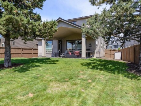 Covered deck . . . home listed by Sandy kohlmoos