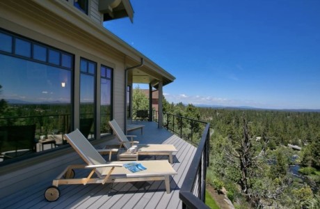 In Bend . . . river, city, and Cascade mountain views. It sold for $1,557,000.