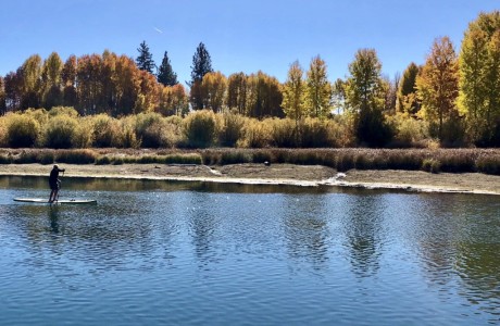 Broker John Kohlmoos races up the Deschutes from Dillon to Benham